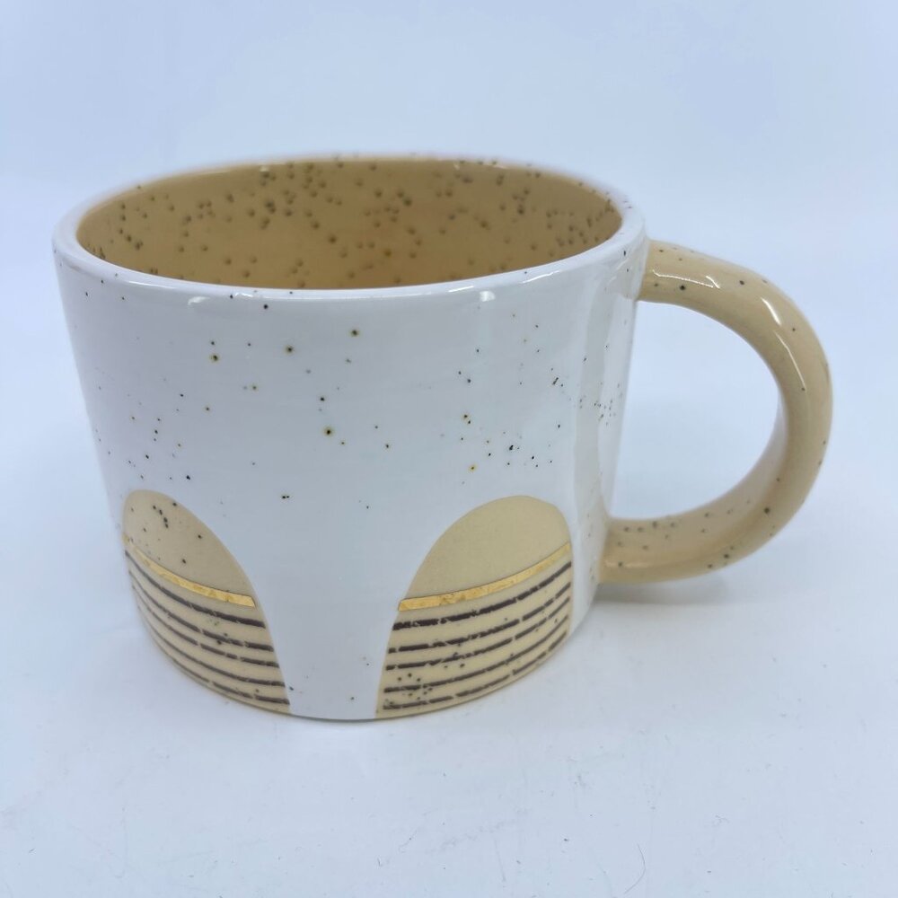anthropologie ceramic mug by cathy terepocki beige speckled finish arches with g